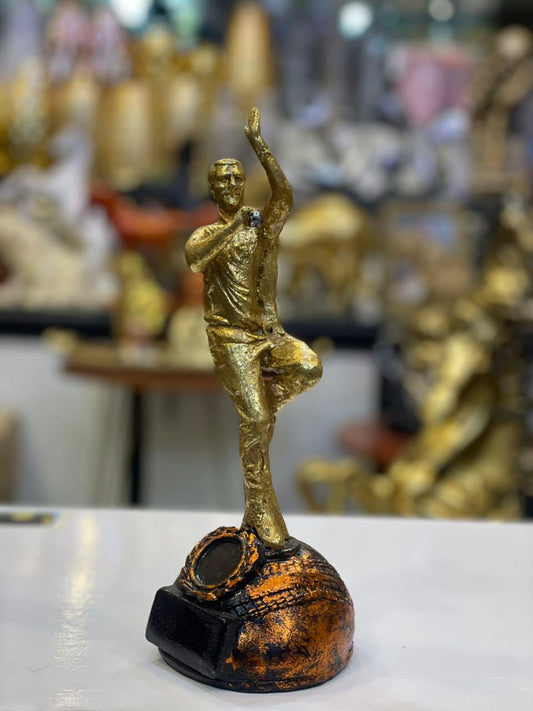 Golden Cricket Bowler Statue